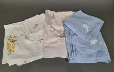 several different types of handkerchiefs are laid out on a table