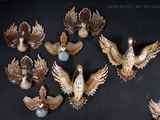 a lot of birds that are sitting on a table