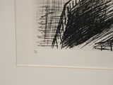 a picture of a black and white drawing on a white wall