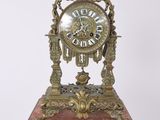 a clock that is sitting on top of a table