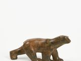 bronze sculpture of a polar bear on a white background