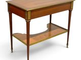 a small wooden table with a shelf on top of it