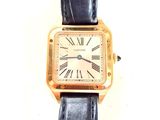 une montre dont le cadran comporte des chiffres romains