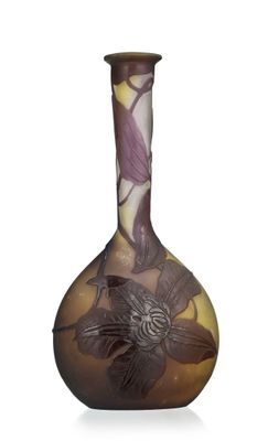 a glass vase with a floral design on it