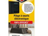 a box with a mouse on it and a mouse on the floor
