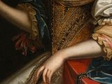 portrait of a woman in a golden dress holding a red box