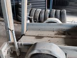 a trailer that has a bunch of tires on it