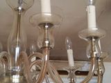 a chandelier that is hanging from the ceiling