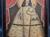 une image d'un tableau représentant une femme tenant un bébé dans ses bras
