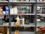 a shelf with various items on it in a room