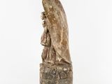 a statue of a woman holding a baby in her arms