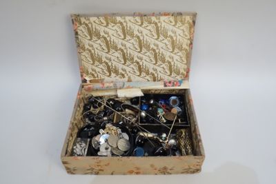 a box full of assorted items sitting on a table