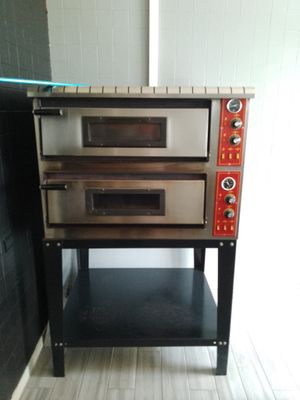 an image of an oven that is sitting on a table