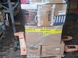boxes stacked on top of each other on a pallet in a warehouse