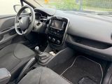 a picture of a car dashboard with a steering wheel