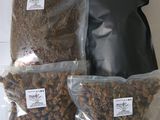 three bags of nuts and a bag of granola