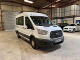 a white van that is parked in a garage