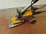 a small machine that is sitting on the floor