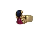 an image of a gold ring with a red and blue stone