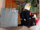 a box full of clothes and other items that are in it