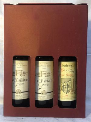 Coffret de 3 bouteilles comprenant: - Photo 1