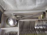 silverware in a box with spoons and spoons in it