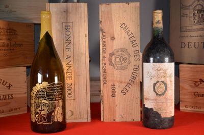 three bottles of wine are sitting next to each other on a table