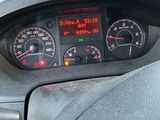 a car dashboard with various gauges and numbers on it