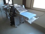 a machine that is sitting on a table in a room