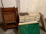 two pieces of furniture that are sitting in a room