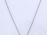 a white gold necklace with a diamond pendant on a chain