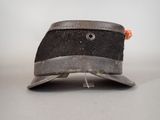 a black hat with a red flower on it