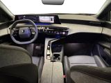 the interior of a car with a steering wheel, dashboard, and dashboard controls