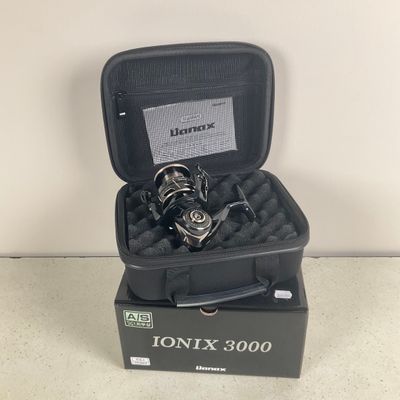 an image of a black box with a fishing reel inside of it