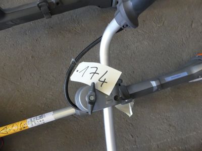 a sticker on the handlebar of a bicycle with a sticker attached to it