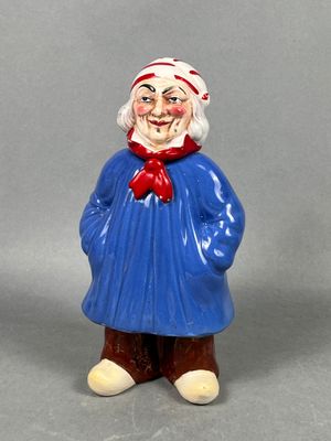 Bouteille à liqueur en faïence polychrome figurant le Pére Magloire. H