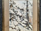une image représentant un tableau d'arbres enneigés, dans un cadre