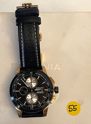 a watch that is sitting on top of a box