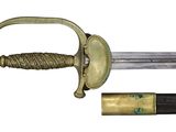 an image of a sword with a brass handle and a wooden handle