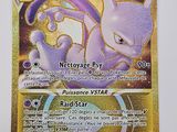 une photo d'une carte Pokémon sur laquelle figure l'image d'un chat