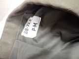 a close up of a jacket with a tag on it