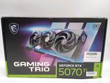 a box of gaming cards on a white surface