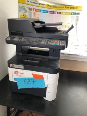 a printer that is sitting on top of a desk