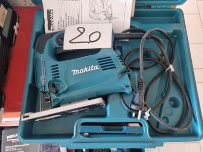 a blue box with a tool in it on a table