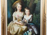 portrait d'un garçon et d'une fille avec un chat près d'un arbre