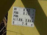 a sign on the side of a yellow building that says pio pio pio pio pio pio pio pio pio pi