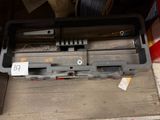 une image représentant une boîte à outils contenant des outils