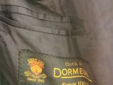 an image of a close up of a jacket with a badge on it
