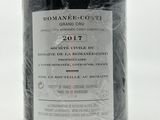 a bottle of wine that is sitting on a table