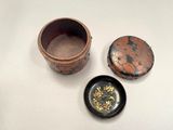 a small bowl and a small bowl sitting on a table